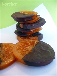 Фото рецепта «Карамелизованные апельсины в шоколаде»